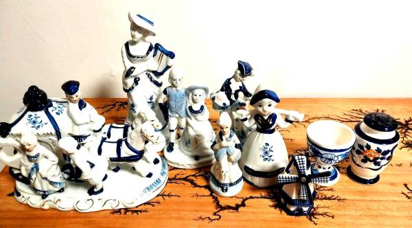 9 piece collection of blue and white vintage figurines